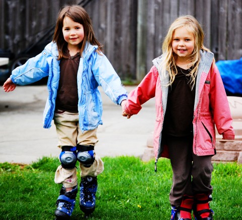 elise and sarah hit the grass in their rollerblades